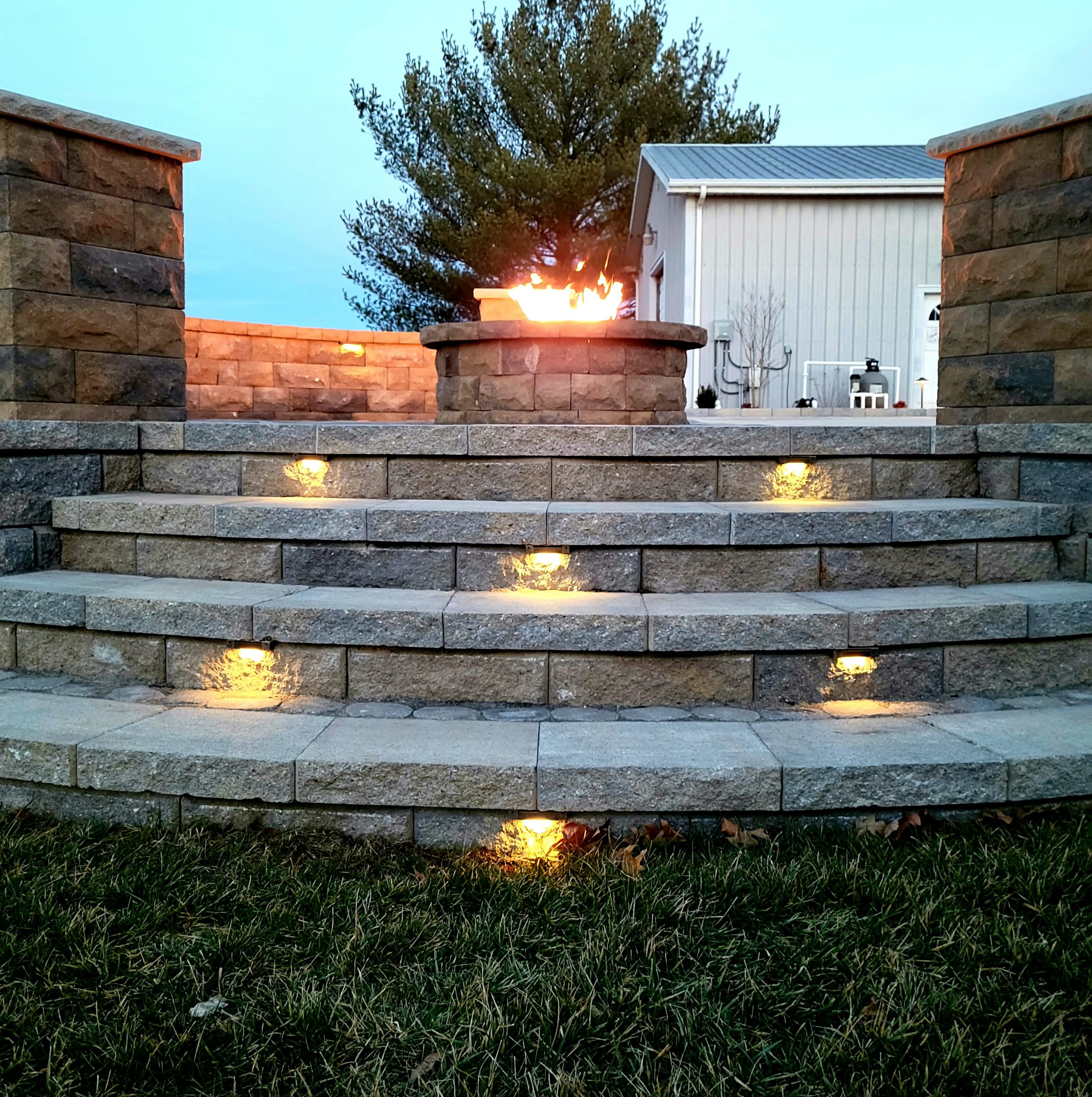 An alternate angle of the landscape lighting setup installed by our team.