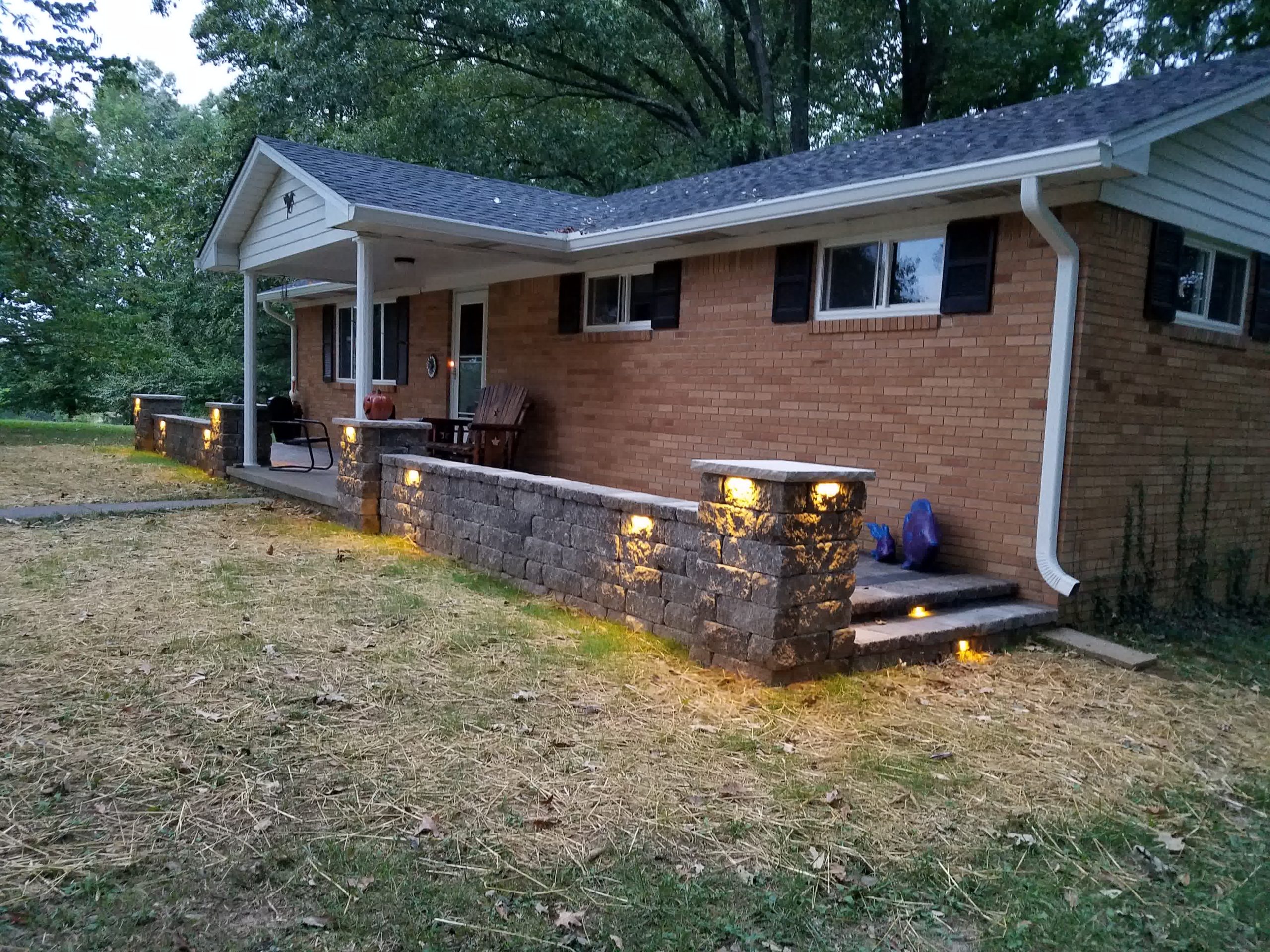 An alternate angle of the lighting our professional crew installed on a stone wall.